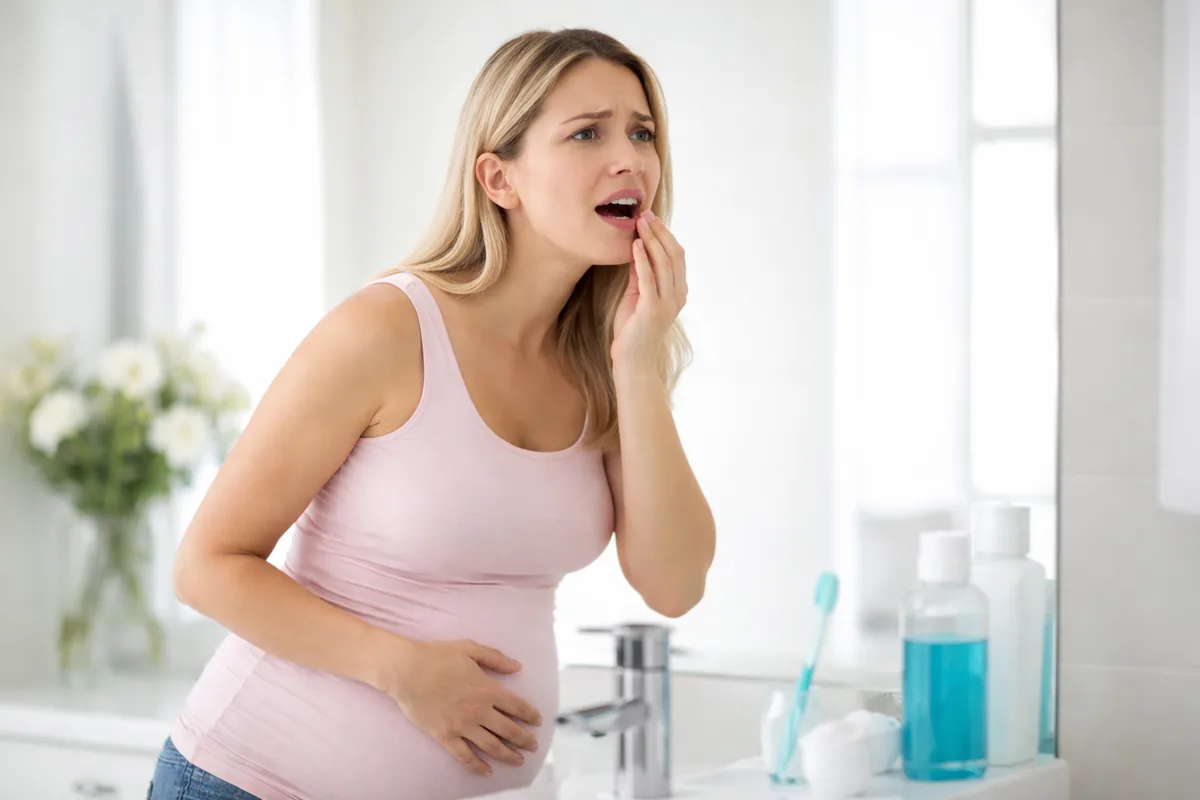 Quels symptômes dentaires peuvent apparaître pendant la grossesse